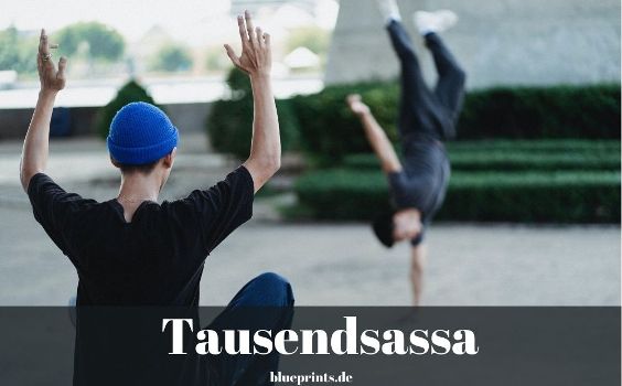 Tausendsassa - Mann macht Handstand auf einem Arm.
