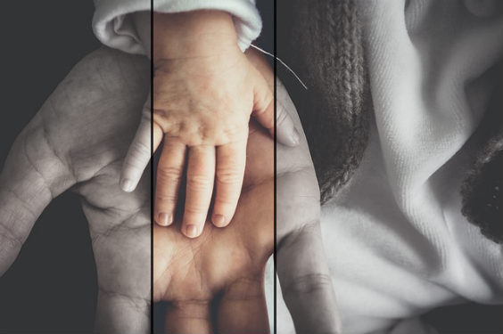 Kleine Hand in großer Hand
